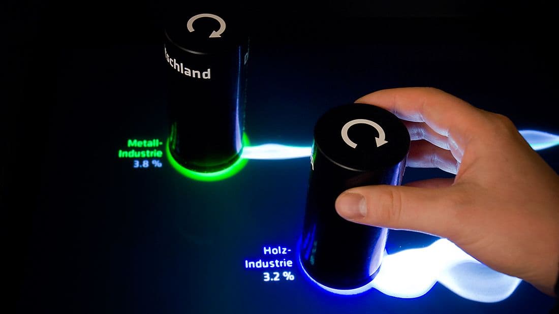 Token stands in an interactive water basin