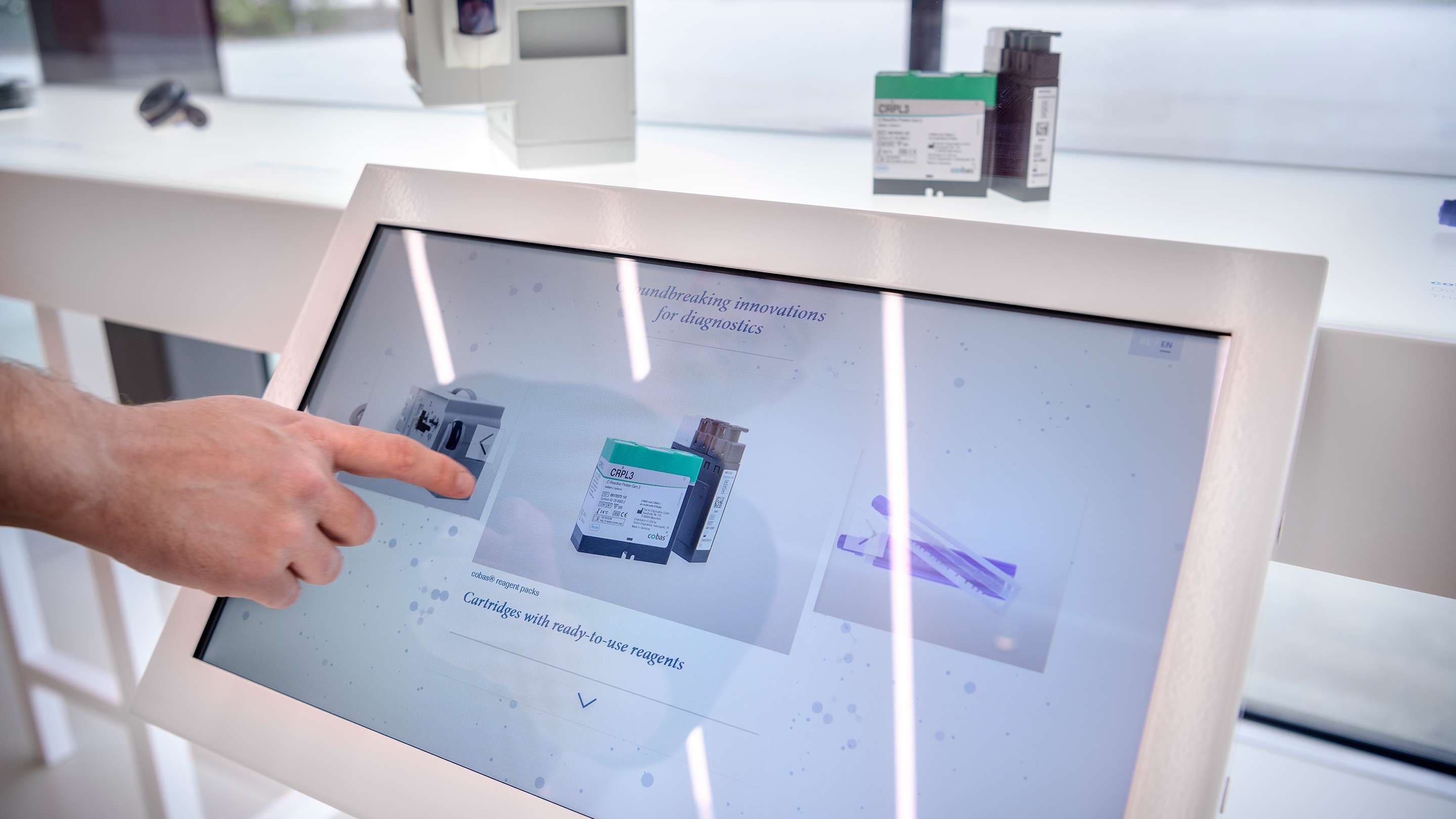 Humans interact with a digital exhibit